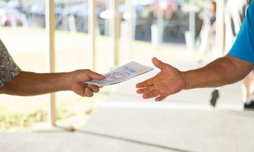 person holding card